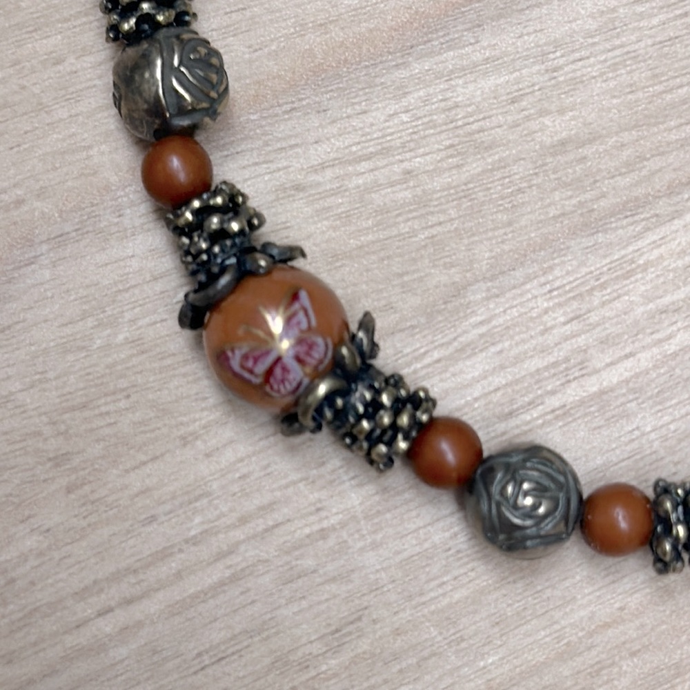 Boho style necklace. Beautiful, rich, earthy colors. Vintage appeal.